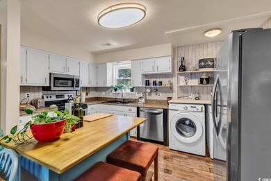 Kitchen featuring light hardwood / wood-style floo