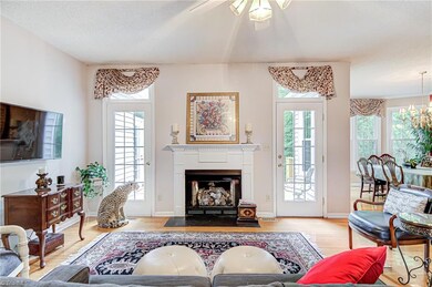Moving from the entry area, this large living room is just right off the dining area, breakfast area, and kitchen - making entertaining a breeze!