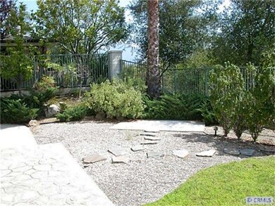 Rear patio and landscaped private yard