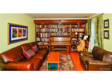 Formal living room with lovely crown detail, built