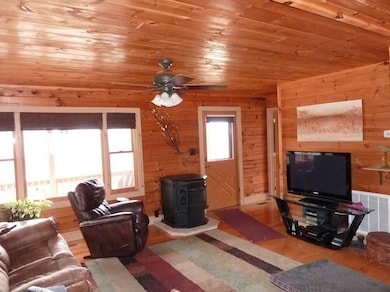 Beautiful knotty pine paneling on interior walls a