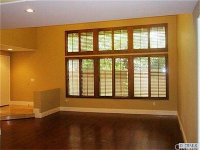 Grand Entry into Living Room with High Windows & D