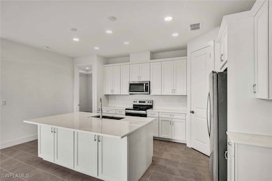 Open-concept kitchen and great room living area