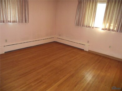 Bedroom with beautiful hardwood floors