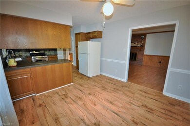 New flooring extends into Dining Room.