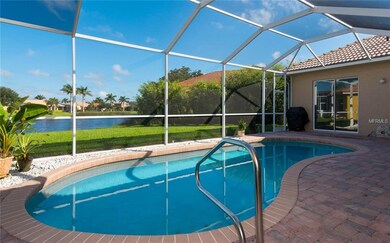 The pool area features paver brick decking and ple