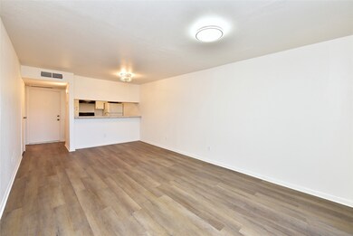 Brand-new vinyl plank flooring throughout the cond
