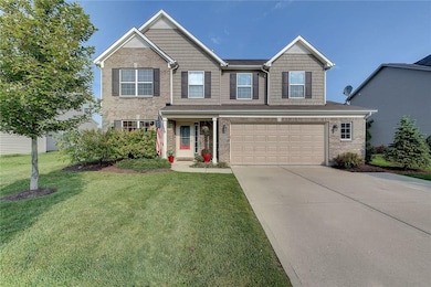 Irrigation system allows for a beautiful lawn all summer long!  Notice the 4 foot bump out on garage for extra storage, new landscaping and widened driveway. 