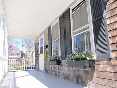 Porch. Front porch with new supports and fresh pai