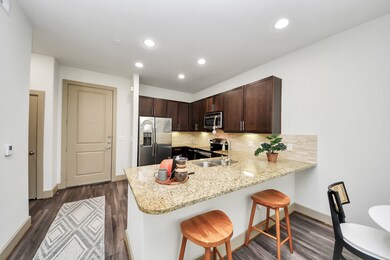 Photos are not of actual units, similar floor plan finishes, verify dimensions