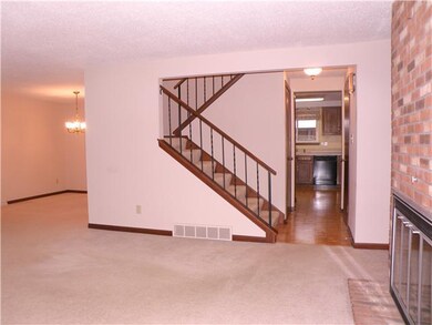 1st Floor Plan. View of kitchen from living room. 