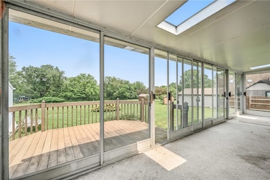 Sunroom offers washer/dryer hook up for 1st floor