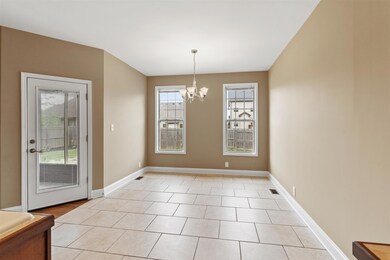 Eat in kitchen overlooks your private back yard.