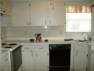 Cozy Kitchen with closet pantry.