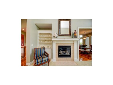 The Formal Living Room includes Gas Fireplace.  Di