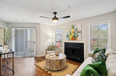 Living room featuring wood-type flooring, ceiling 