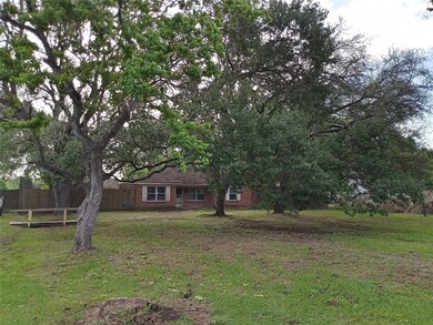 SPACIOUS FRONT YARD.