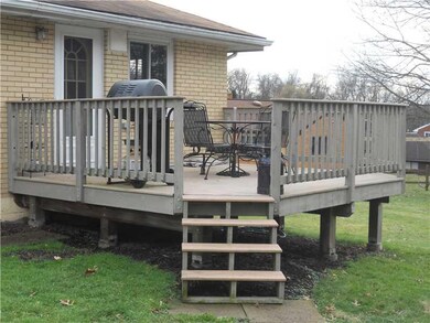 Patio/Deck. Right off the kitchen.  Nice for enter