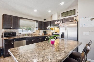 Gorgeous updated kitchen with large window over th