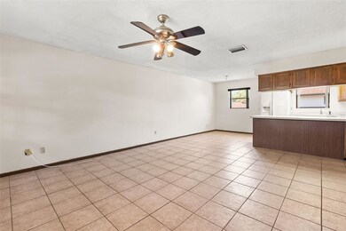 Large open concept living room, dining room, and k