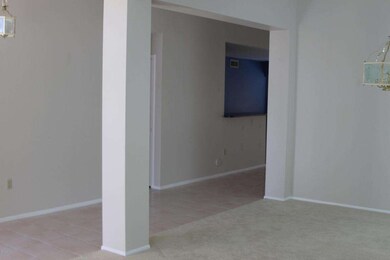Hallway to open sunny formal living room