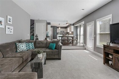 Great Room opens to Dining and Kitchen & walks out