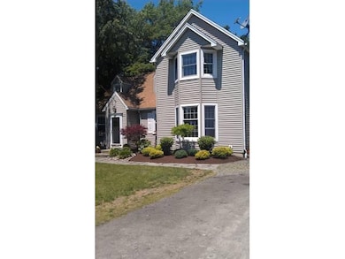 Exterior Front. professionally landscaped approach