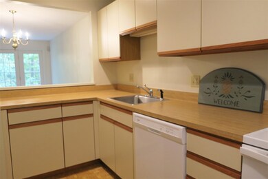Kitchen with opening to the dining area