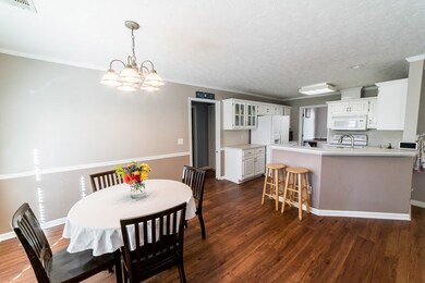 Opens into kitchen