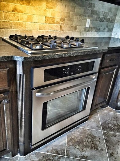 Built in gas stove and stainless steel appliances