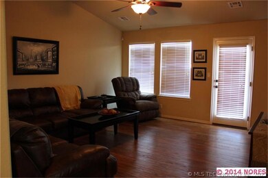 Spacious Living Area with door to back patio