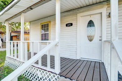 Walk up the steps to your covered patio. All that's needed is a favorite chair.
