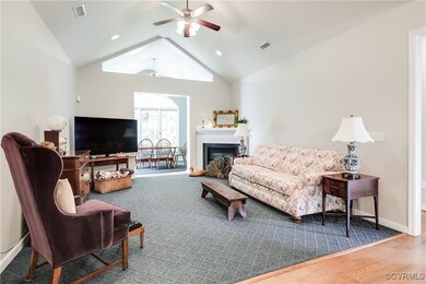 Family Room with Carpet and Ceiling Fan
