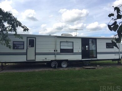 This travel trailer will stay with the pond for th