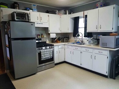Kitchen with lots of cabinetry.