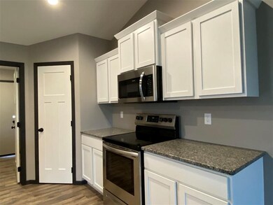 406 Dawson Dr, West Branch, IA 52358 - photo 2