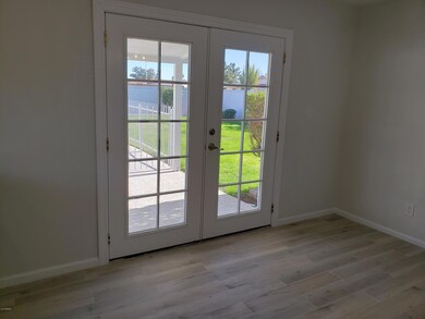 Family Room Overlooking Grassy Backyard