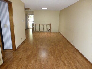 Living room looking toward stairs to LL