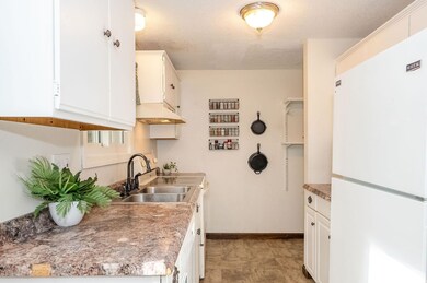 12 Cedarbrook Village unit D, Rochester, NH 03867 - photo 2