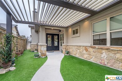 Private courtyard with gated access.