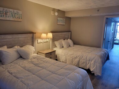 Bedroom with wood finished floors