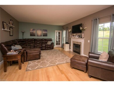Large living room with beautiful fireplace and nic