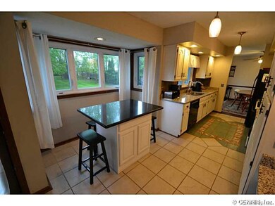 Kitchen. Kitchen island with solid surface top.
