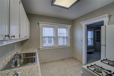 Downstairs apartment kitchen is freshly painted includes all appliances