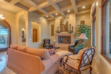 Formal Living with stone fireplace