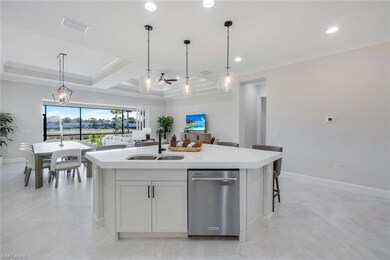 Kitchen with recessed lighting, a kitchen island w