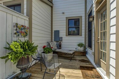 private deck and back yard area.  HOA takes care of all exterior front landscaping/sprinkers/water, owner is responsible for back yard.