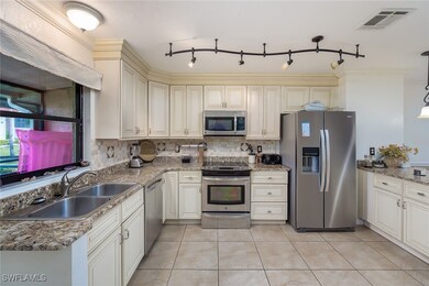 Kitchen with appliances with stainless steel finis