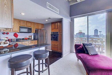 The kitchen in this 2bed/2bath condo was recently remodeled to create a more open concept into the living and dining space. Other updates include granite counter tops and stainless steel appliances.