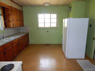 View from hall dining room to kitchen.